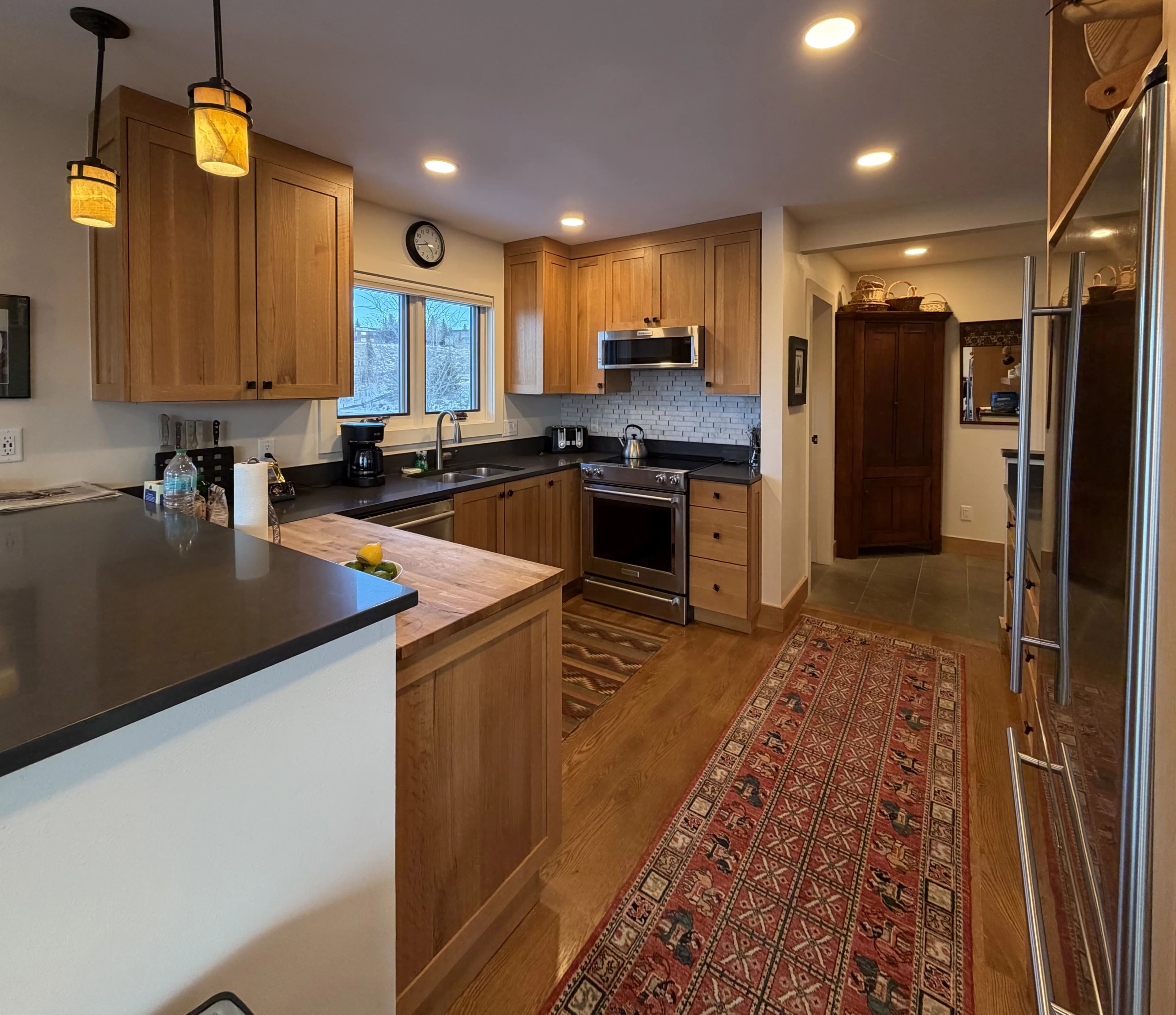 Modern full kitchen with stainless appliances - Spring Creek Ranch
