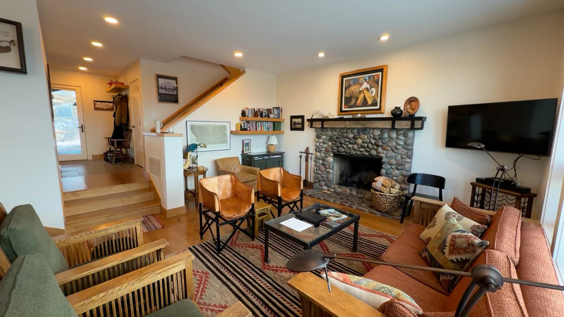 River stone fireplace in main living room - Spring Creek Ranch Jackson Hole